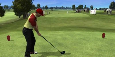 Golfer teeing off