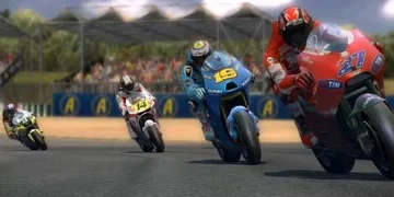 Casey Stoner, leading a group of bikes round the track