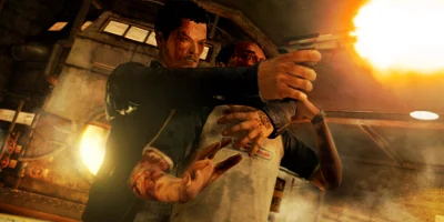 man shooting a gun, holding a man as hostage