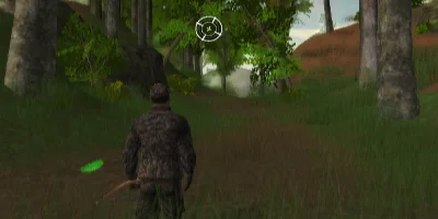 man walking down a path with his gun out
