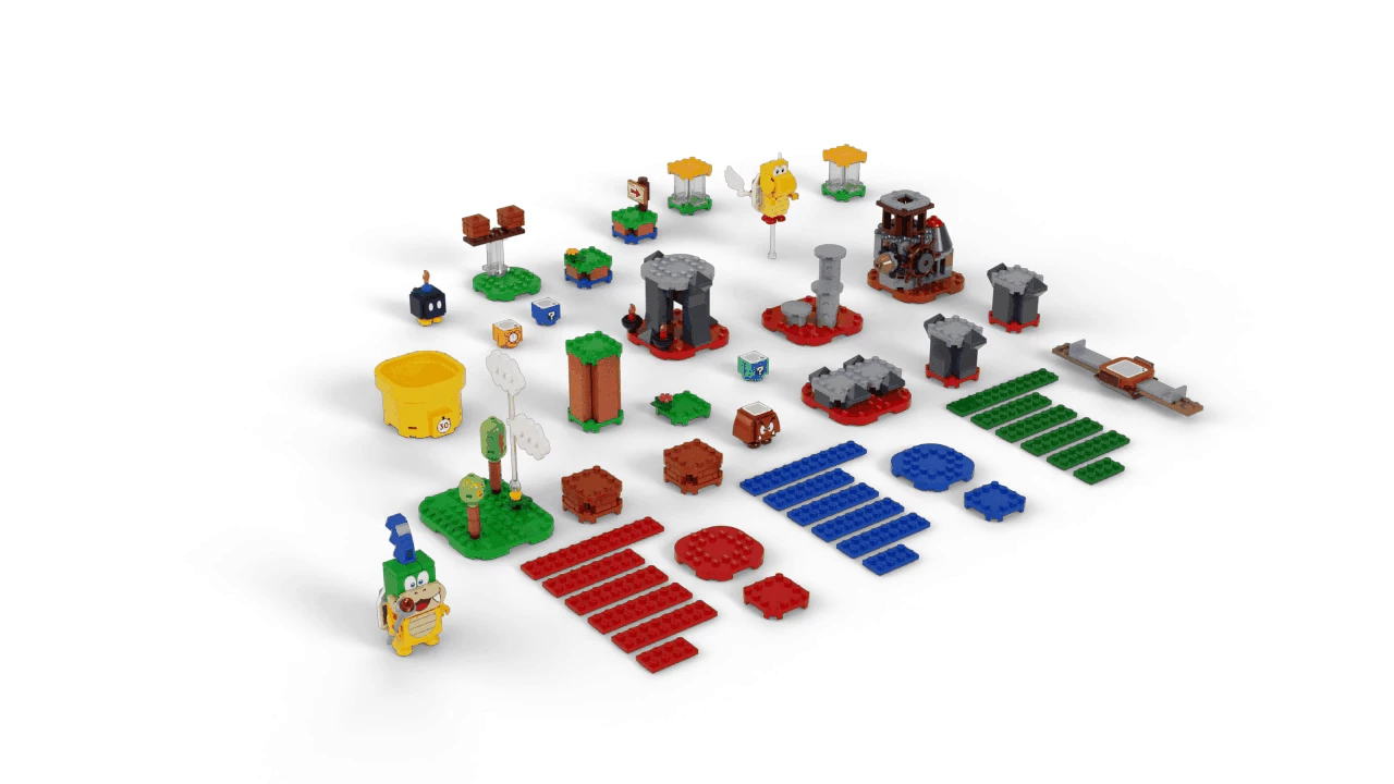 close up of children playing with lego on a table