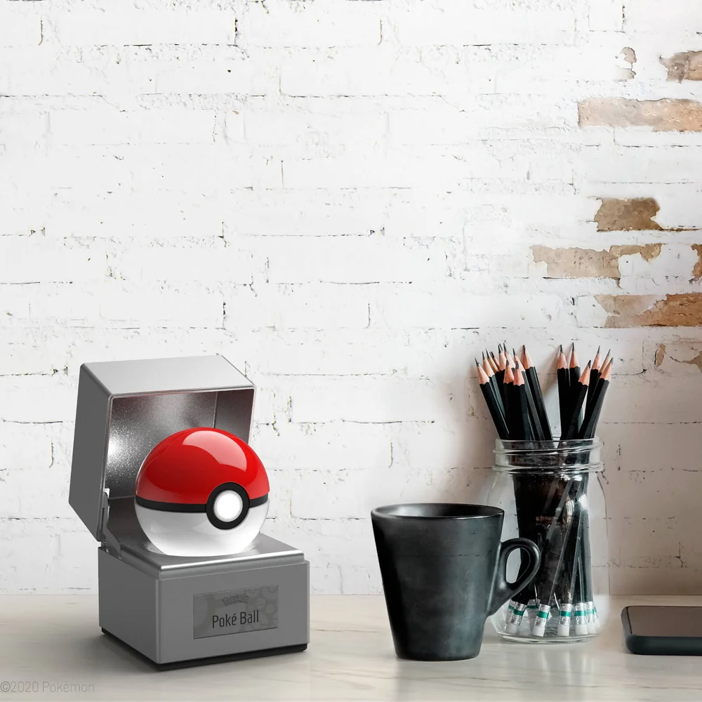 The Wand Company Original Poké Ball Authentic Replica - Realistic, Electronic, Die-Cast Poké Ball with Display Case Light Features - Officially Licensed by Pokémon The Wand Company Original Poké Ball Authentic Replica - Realistic, Electronic, Die-Cast Poké Ball with Display Case Light Features - Officially Licensed by Pokémon