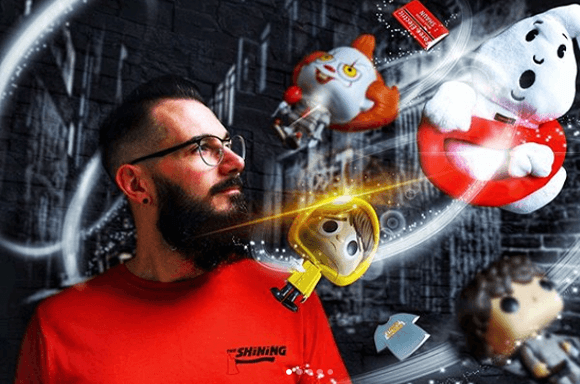 A man with The Shining tshirt and memorabilia